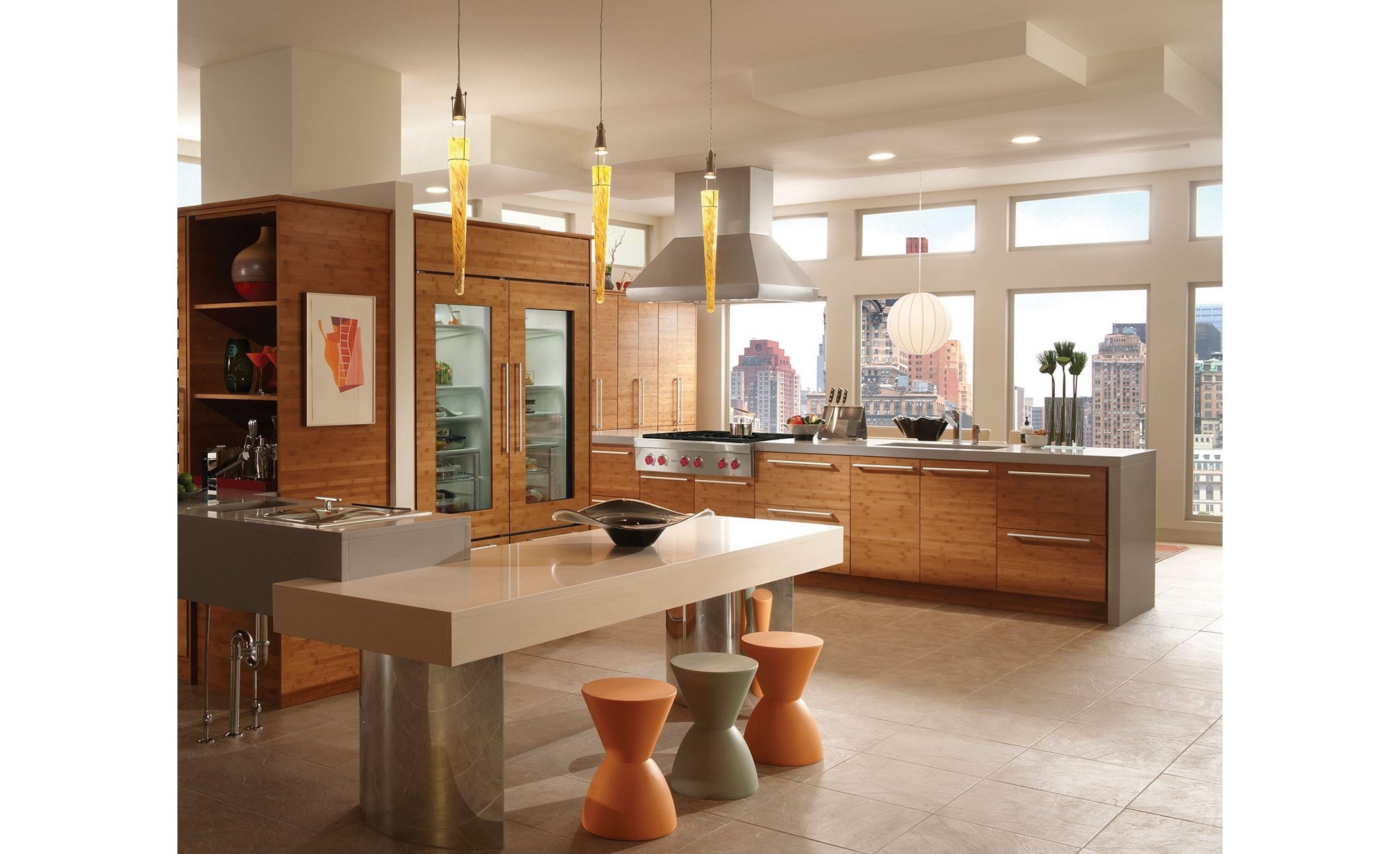 The Wolf 36" Sealed 6 Burner Rangetop (SRT366) shown in a large contemporary l-shaped kitchen with flat-panel cabinets