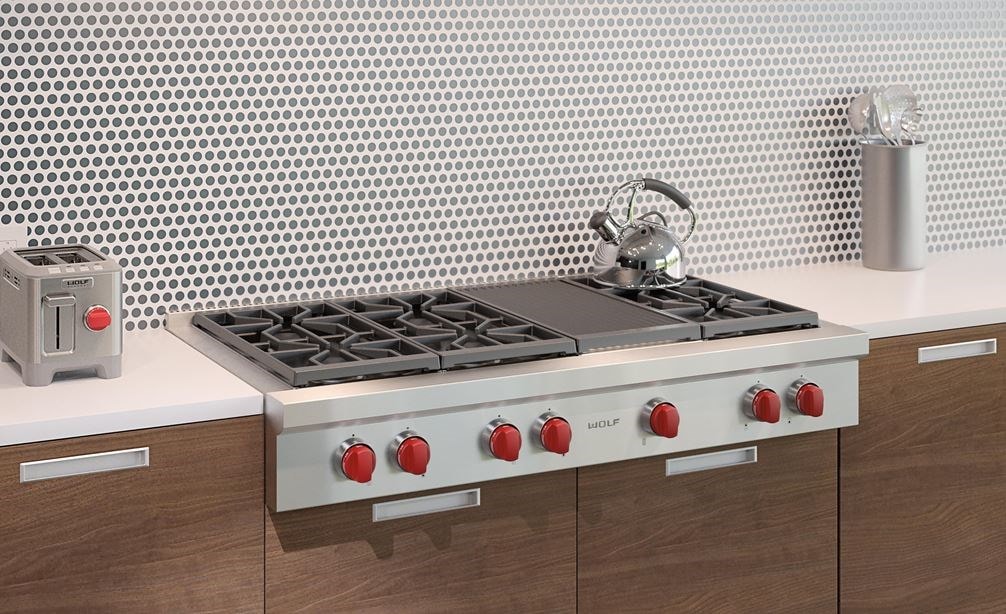 Wolf 48&quot; Sealed 6 Burner Rangetop and Infrared Charbroiler (SRT486C) shown in a clean and sleek kitchen with streamlined surfaces