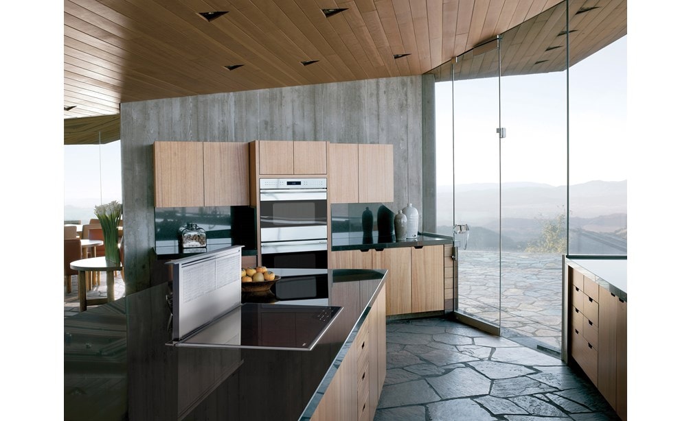 The Wolf 30" E Series Transitional Built-In Double Oven (DO30TE/S/TH) paired with a Wolf 36" Transitional Induction Cooktop (CI365T/S)