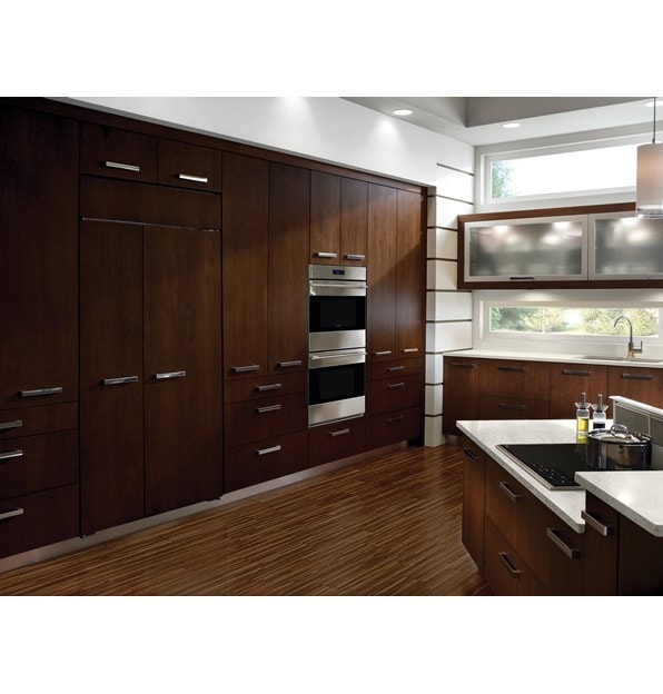 The Wolf 30" E Series Transitional Built-In Double Oven (DO30TE/S/TH) shown sitting flush in a rich and efficient modern kitchen design.