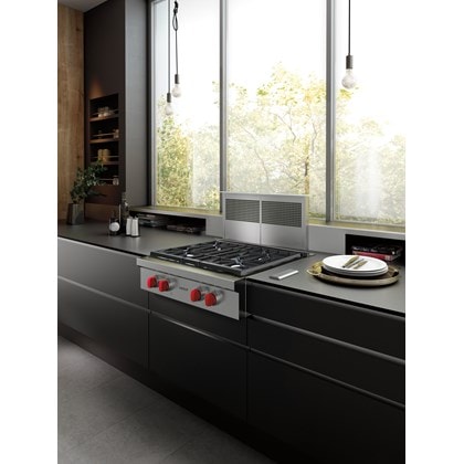 The Wolf 30" Downdraft Ventilation (DD30) featured with Wolf 30" Sealed Burner Rangetop - 4 Burners (SRT304) with signature red knobs