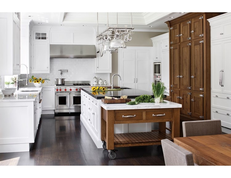 Wolf 54" Pro Wall Hood 27" Depth (PW542718) shown with 48" Gas Range 6 Burners and Infrared Griddle (GR486G) in classic white kitchen