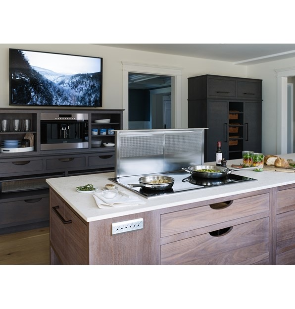 Wolf 36" Downdraft Ventilation (DD36) shown with Wolf 36" Transitional Induction Cooktop (CI365T/S) in natural wood finish kitchen island