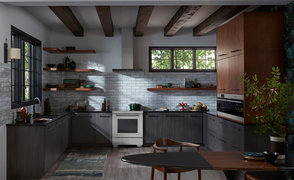 Wolf 30&quot; Induction Range shown in luxurious New York townhome featuring open shelves, wood ceiling beams and cast iron accents.