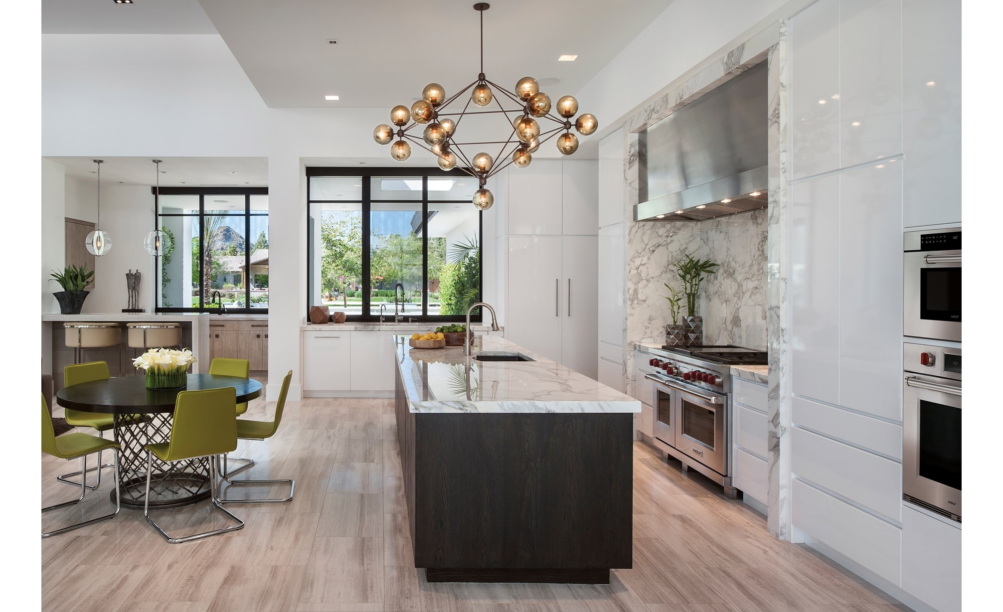 The Wolf 48" Dual Fuel Range 6 Burner Infrared Griddle (DF486G) with 30" M Series Professional Convection Steam Oven (CSO30PM/S/PH)