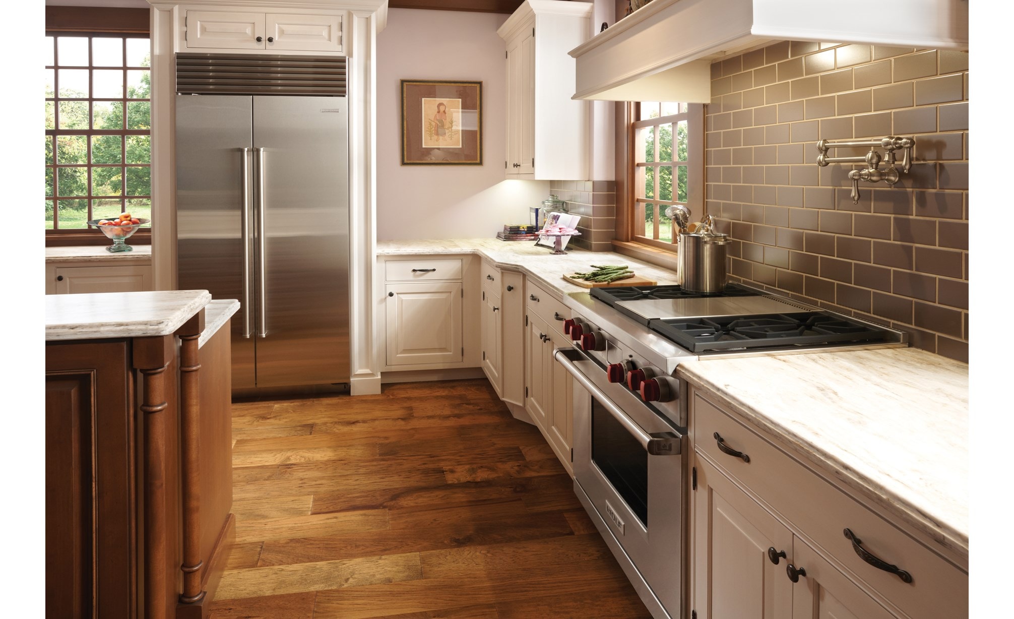 The Wolf 36" Dual Fuel Range 4 Burner Infrared Griddle (DF364G) with Sub-Zero 36" Classic Side by Side Refrigerator Freezer (BI-36S/S)