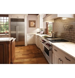 The Wolf 36" Dual Fuel Range 4 Burner Infrared Griddle (DF364G) with Sub-Zero 36" Classic Side by Side Refrigerator Freezer (BI-36S/S)