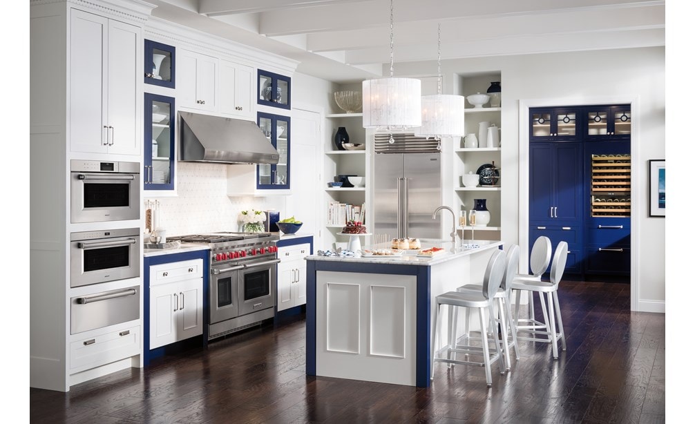 The Wolf 48" Gas Range 6 Burner Infrared Charbroiler (GR486C) paired with Sub-Zero 36" Classic Side by Side Refrigerator Freezer (BI-36S/S)