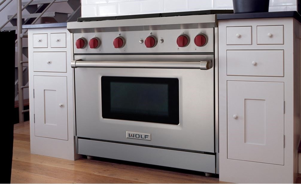 The Wolf 36&quot; Gas Range 6 Burner (GR366) Rangetop shown blending seamlessly into a simple and elegant kitchen design.