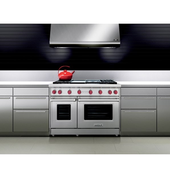 The Wolf 48" Gas Range 4 Burner Infrared Charbroiler Infrared Griddle (GR484CG) shown in a contemporary modern kitchen design