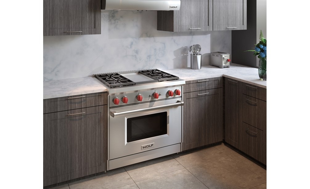 The Wolf 36" Gas Range 4 Burner Infrared Griddle (GR364G) shown with its stainless steel construction and classic brushed finish.