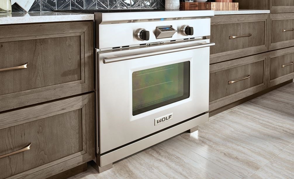 The Wolf 36&quot; Transitional Induction Range (IR365TE/S/TH) featured with Wolf Gourmet Cutlery (WGCU100S)