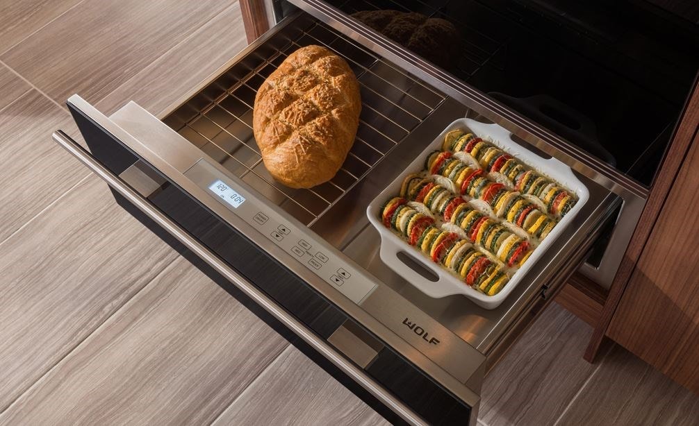 The Wolf 30&quot; Warming Drawer (WD30) shown displaying hidden electronic controls that are easy to see and use when you pull out the drawer.